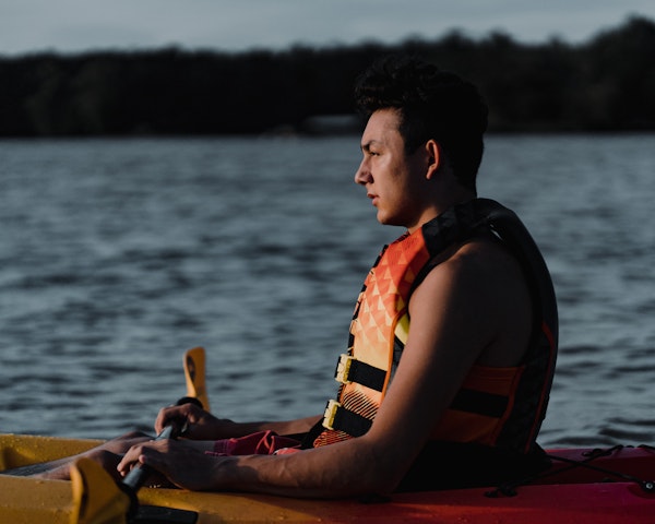 A young man kayaking on Lake Murray, SC - Photo Credit Pete Salter