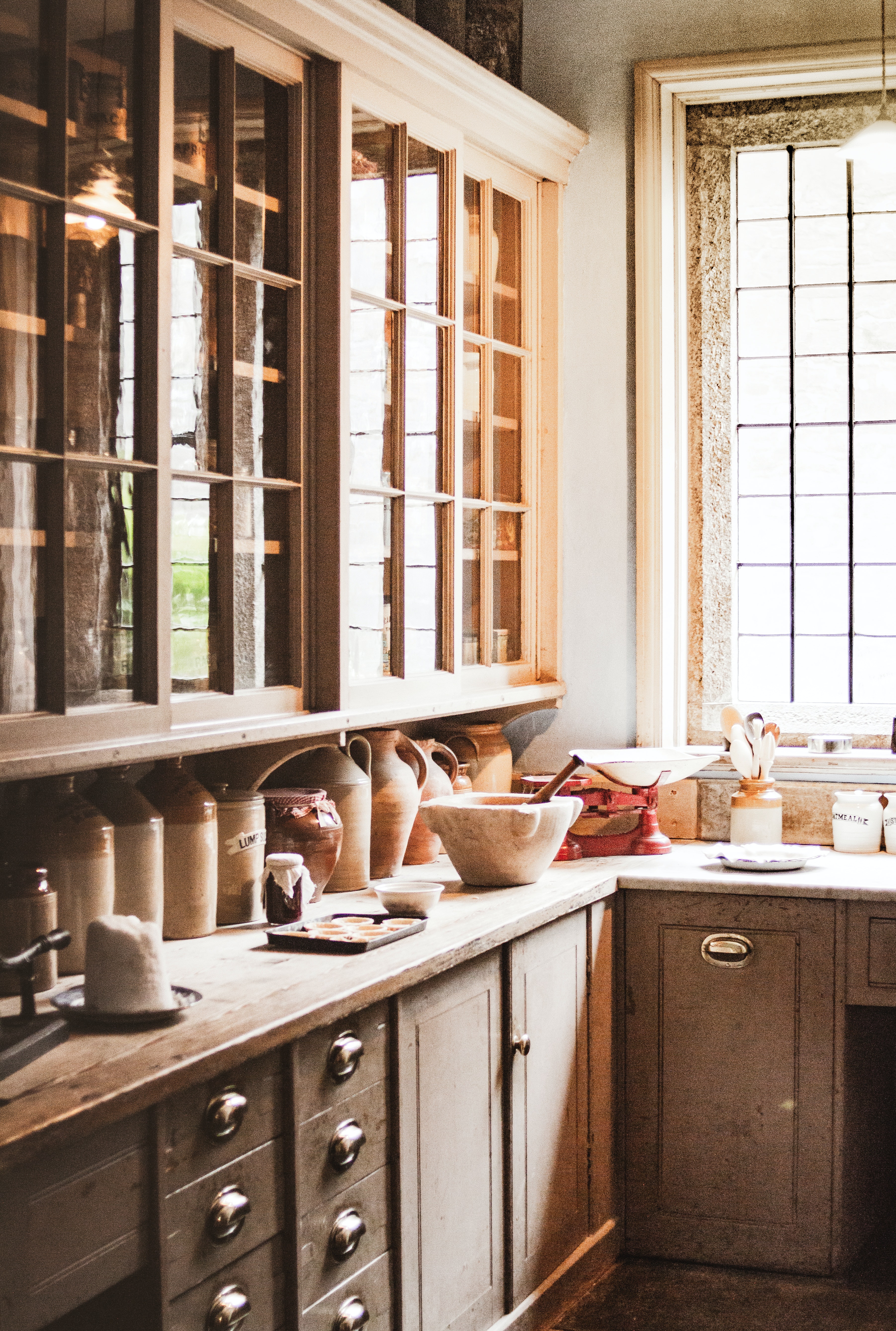 Walk-in scullery with cabinets and counter space