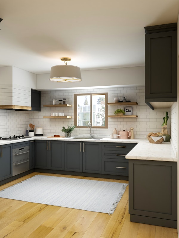 Dark gray kitchen cabinets in a luxury kitchen with white subway tile and open shelving made of natural wood
