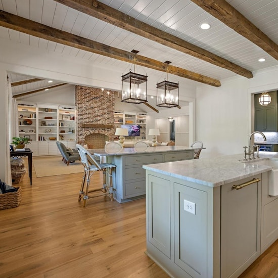 Modern Craftsman Kitchen With Two Kitchen Islands Rustic Hardwood Beams Oversized Pendant Lights And A Scullery