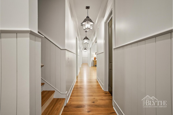White Wainscoting In A Hallway 1