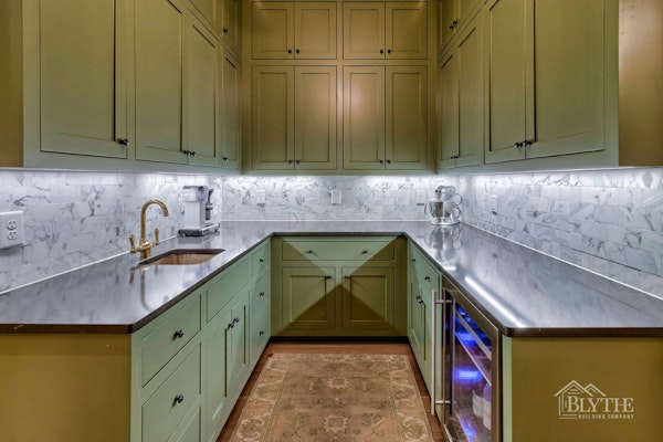 U Shaped Scullery Between Kitchen Adn Dining Room With Green Cabinets And Wine Cooler