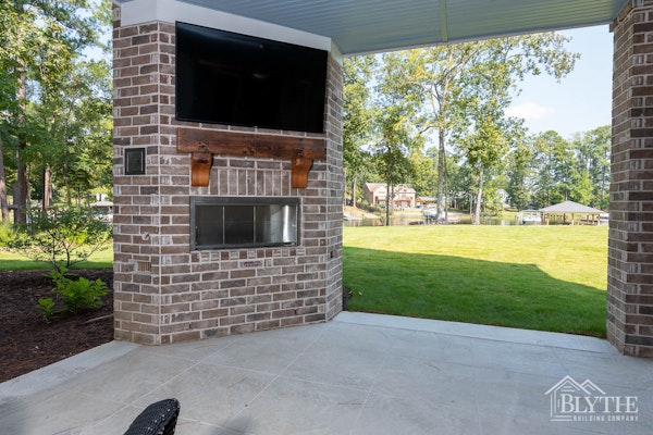 Backporch With Fireplace And Tv