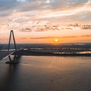 Charleston SC at sunset from drone view of the Ravenel Bridge