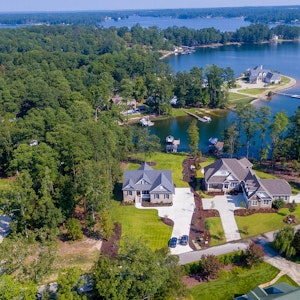 Very Distant Drone Shot of lake homes With Lake Murray