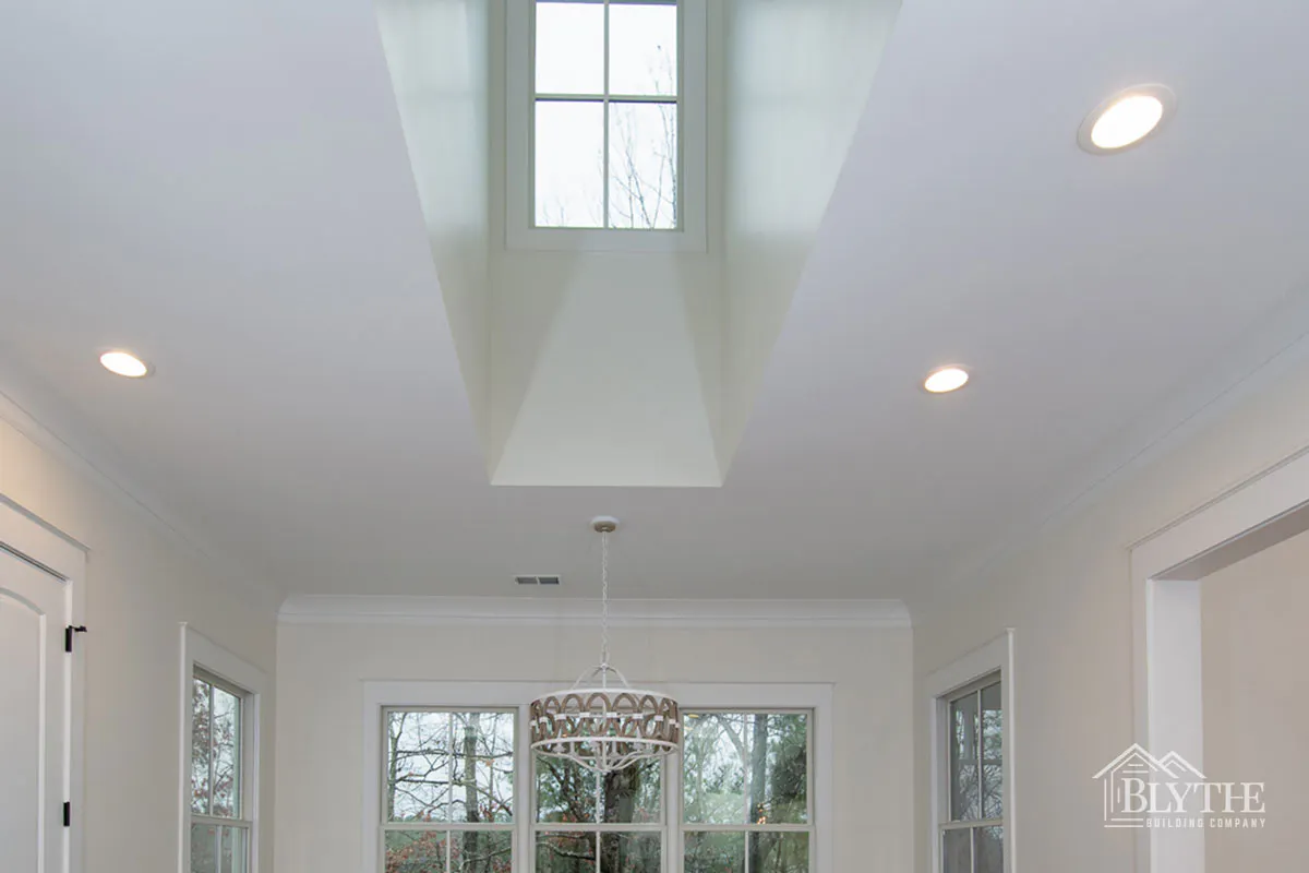 Eating Area With Vaulted Ceiling And Dormer Window 1