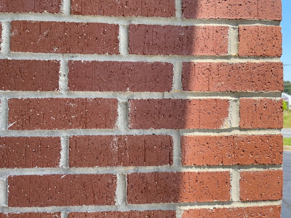 Red Brick Wall With Concave Mortar Joints 